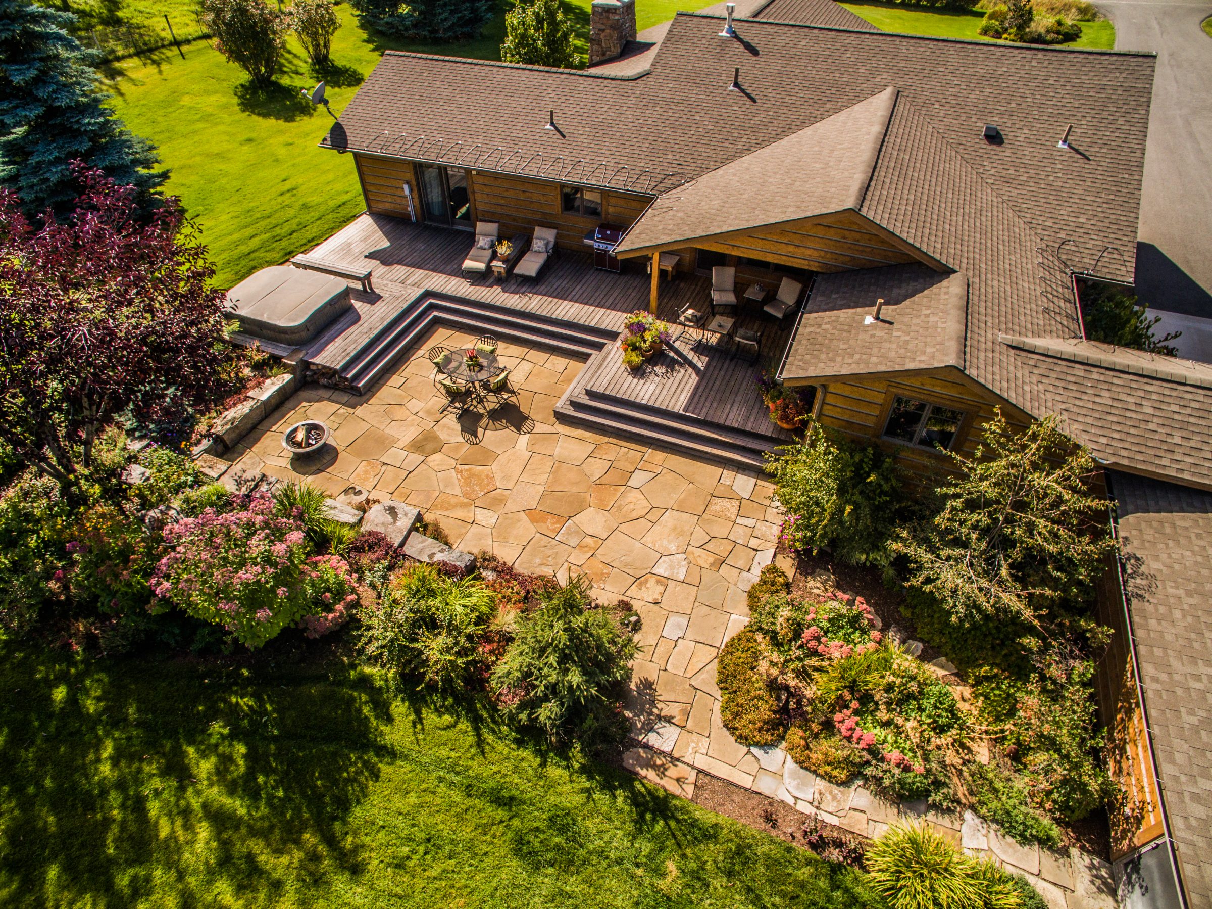 Aerial view of backyard patio and deck
